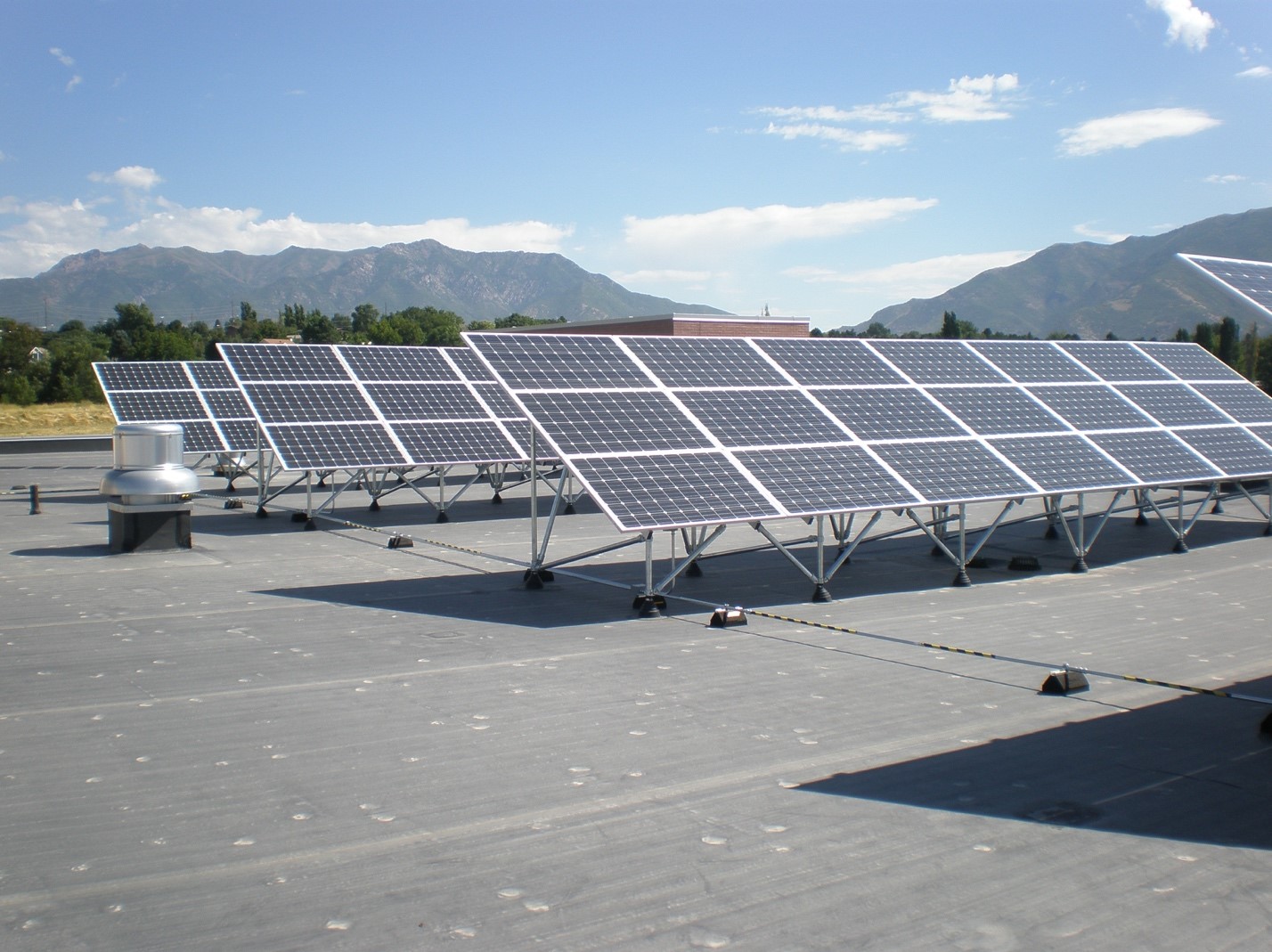 A rooftop solar installation at the Davis campus reduces the school’s reliance on fossil fuels. The university is in the process of building a 7-acre solar installation that will generate nearly two megawatts of electricity. (Photo courtesy of Weber State University)