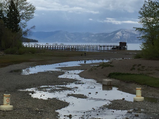 Buoys sit in the dry riverbed of the Truckee River in this photo from June 2015. The river exits Lake Tahoe at Tahoe City dam, but because the lake’s water level was below the rim, the Truckee slowed to a mere trickle. 