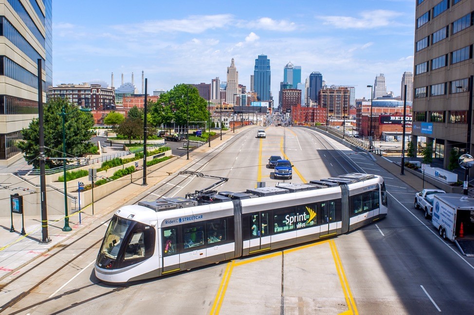 A free streetcar drives through downtown Kansas City. The greater Kansas City region, managed by the Mid-America Regional Council (MARC), has been designated by the White House as a “Climate Action Champion” community in the United States. MARC participated in a pilot test of the Resilience Dialogues. Photo by Flickr user Jason Doss; shared under the Creative Commons Attribution 2.0 Generic license.