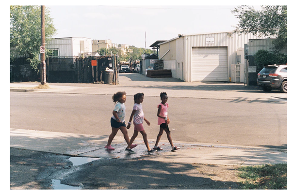 Children on a sidewalk