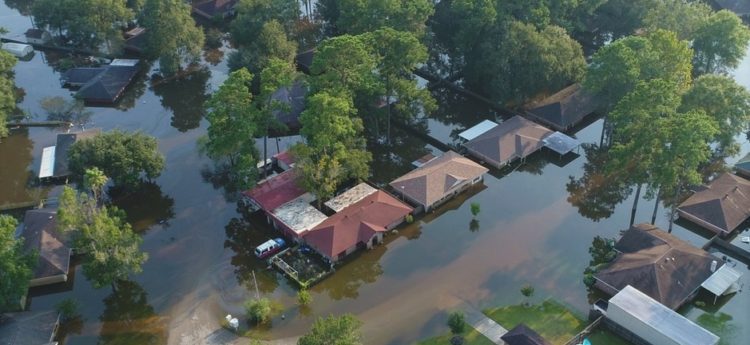 an aerial photograph of a flooded community