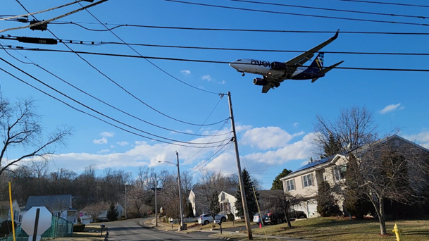 Plane Landing over neighborhood