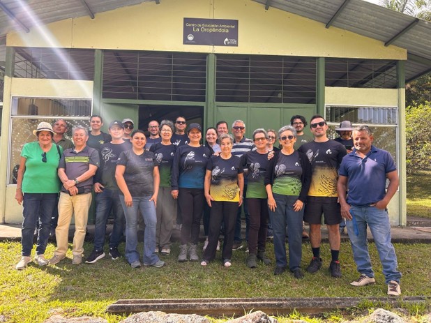Group of people standing in front of a porch in Costa Rica