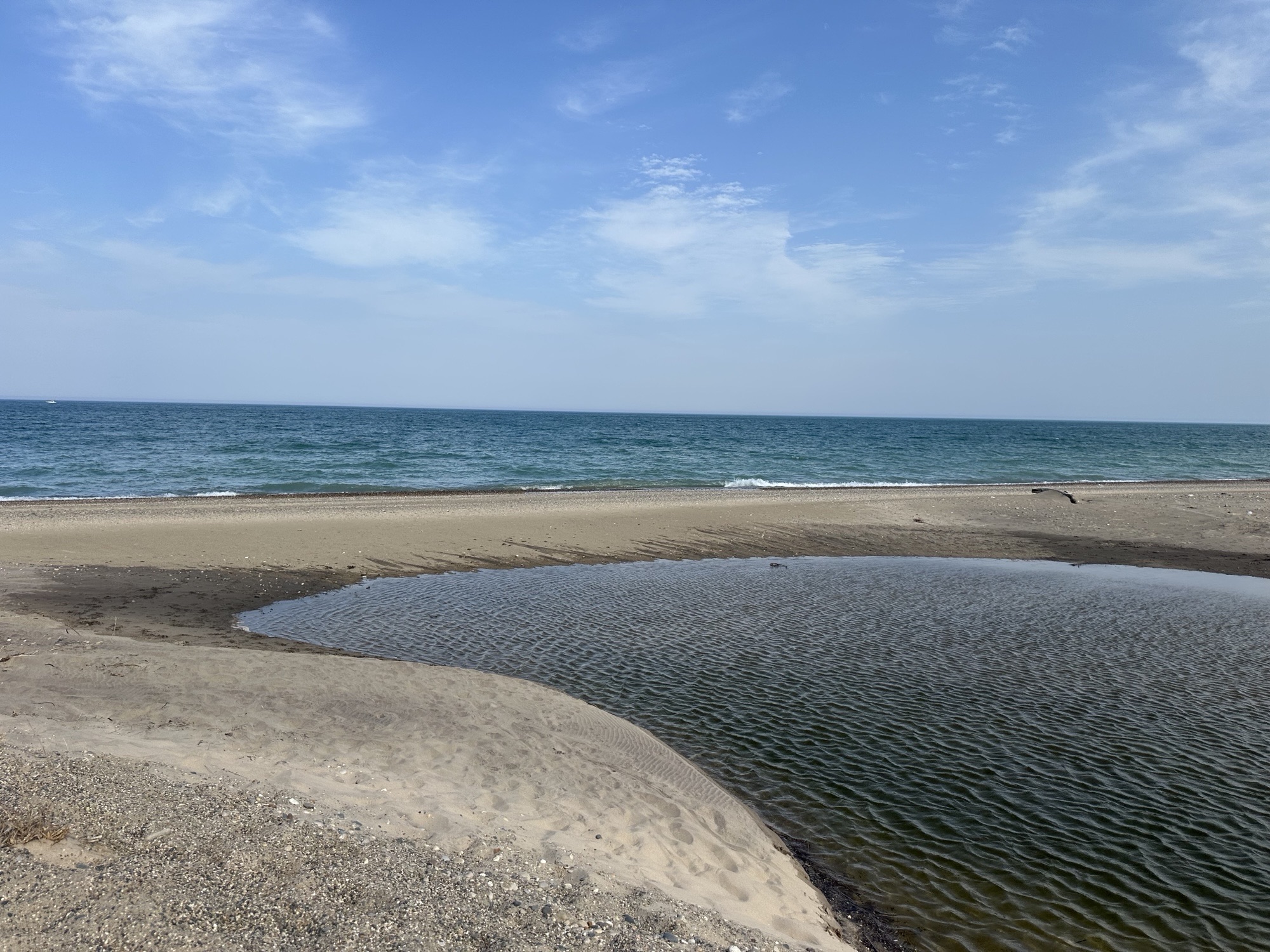 Water from the Mouth of the Dead River where it enters Lake Michigan