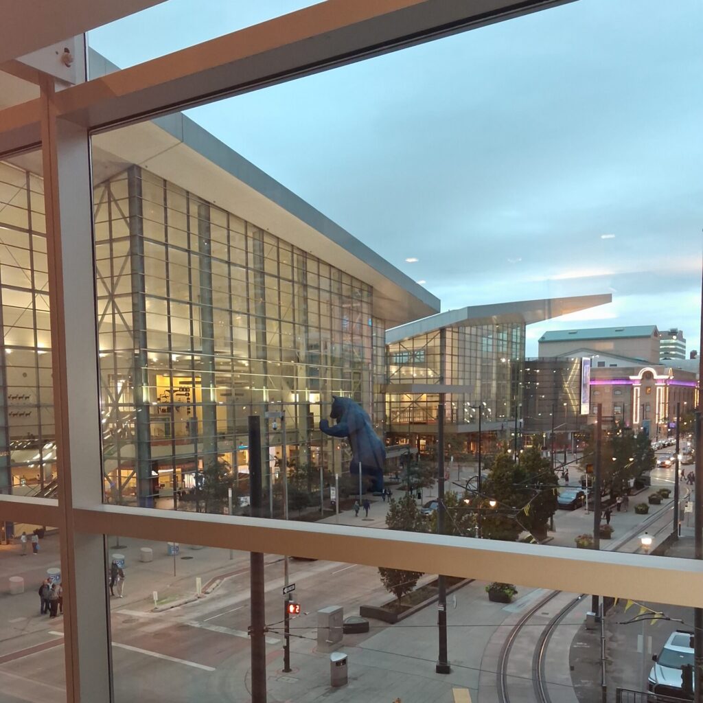 Image of a convention center as seen through a window